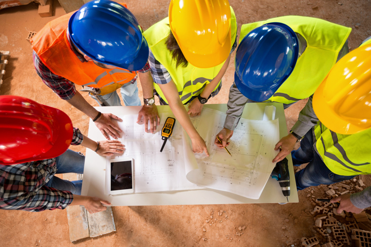 Top view of architects check blue print